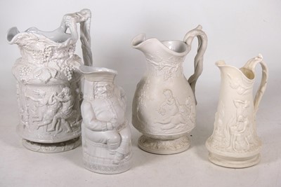 Lot 151 - A collection of Victorian relief moulded jugs...