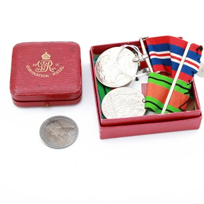 Lot 264 - A pair of World War Two medals, being Defence...