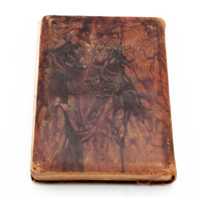 Lot 287 - A miniature Kur'an bound in brown leather with...