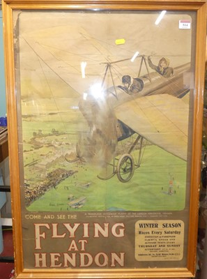 Lot 514 - A framed poster print 'Flying at Hendon',...