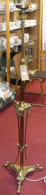 Lot 539 - A gilt brass telescopic standard lamp, in the...