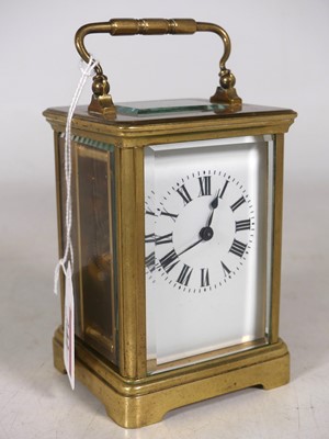 Lot 242 - A 20th century lacquered brass cased carriage...