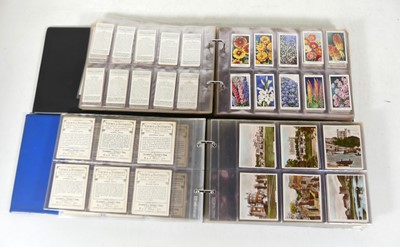 Lot 343 - An album of cigarette cards to include, Senior...