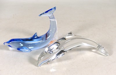 Lot 245 - Two Baccarat glass dolphin ornaments, 20th...