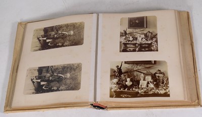 Lot 248 - A Victorian photograph album, the contents to...