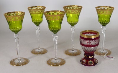 Lot 221 - A set of five wine glasses, each having a lime...