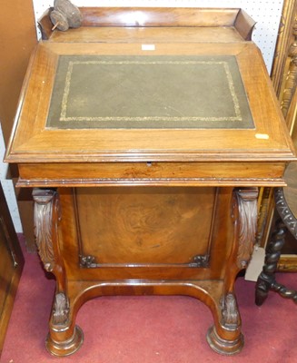 Lot 547 - A mid-Victorian figured walnut slope front...