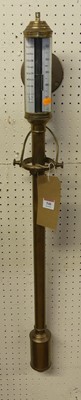 Lot 548 - A reproduction brass gimballed ship's barometer