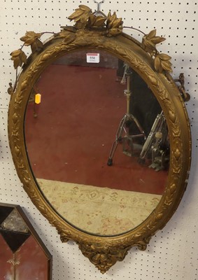 Lot 550 - A late 19th century gilt wood and gesso oval...