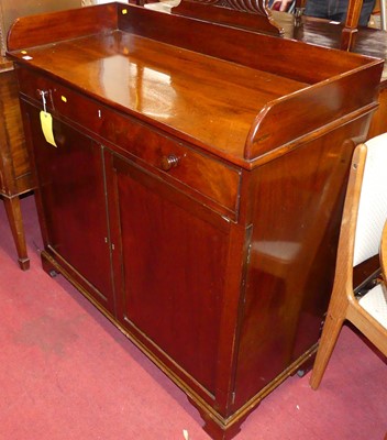 Lot 566 - A George IV mahogany double door side cupboard,...