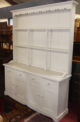 Lot 572 - A large white painted pine kitchen dresser,...
