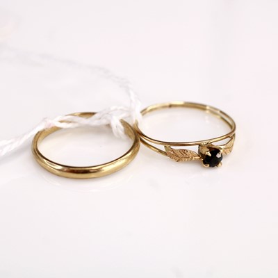 Lot 350 - A 9ct gold wedding band, size L; together with...