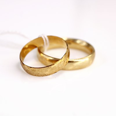 Lot 352 - A 9ct gold wedding band, size Y; together with...