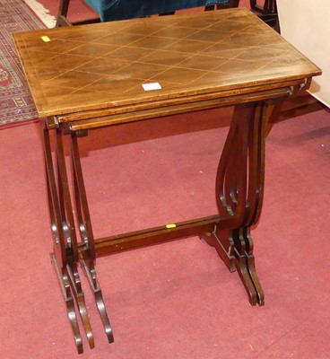 Lot 579 - A mahogany and chequer strung nest of three...