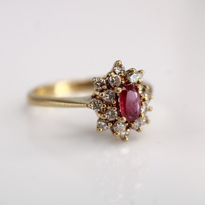 Lot 354 - A 9ct gold,ruby and white sapphire flower head...
