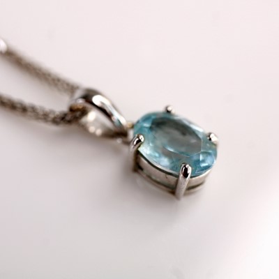 Lot 357 - A 9ct white gold aquamarine pendant, the...