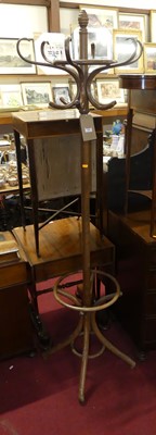Lot 596 - A beech bentwood combination hat/stick/coat...