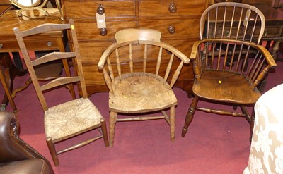 Lot 642 - A 19th century elm stickback Windsor chair,...