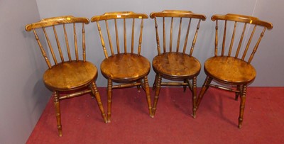 Lot 649 - A set of four early 20th century elm and...