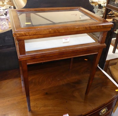 Lot 598 - A mahogany and perspex table top shop display...