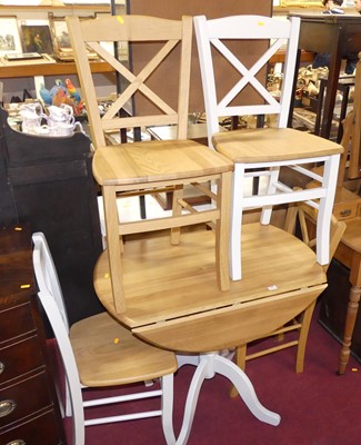 Lot 600 - A contemporary drop flap kitchen table,...