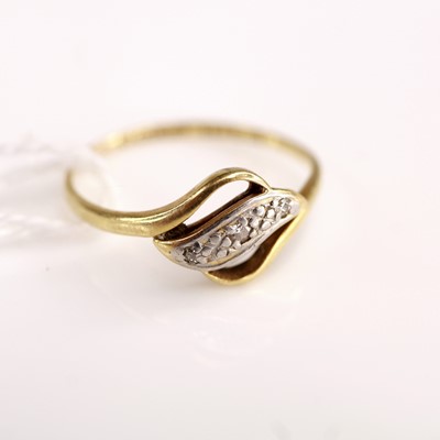 Lot 360 - An 18ct gold and platinum diamond highlight...