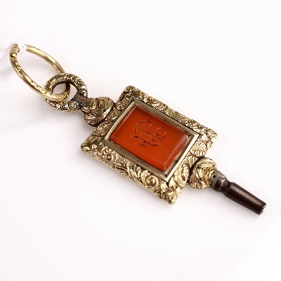 Lot 364 - A George III gilt metal and agate set watch...