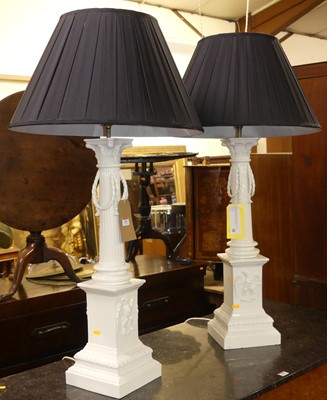Lot 668 - A large pair of white glazed ceramic...