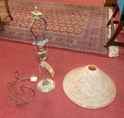 Lot 615 - A silvered cast metal table lamp, having a...