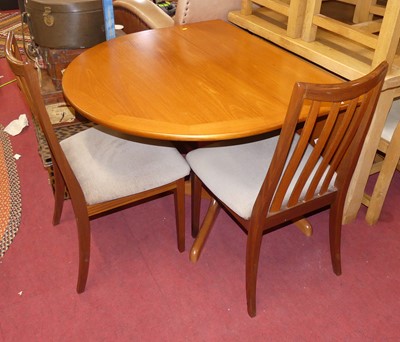 Lot 622 - A 1970s G-Plan Fresco teak dining suite,...