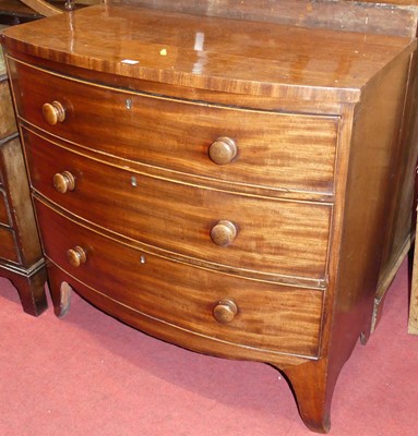 Lot 684 - A mid-19th century mahogany bowfront chest of...