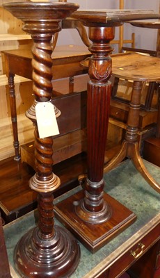 Lot 685 - Two similar hardwood pedestal plant stands,...