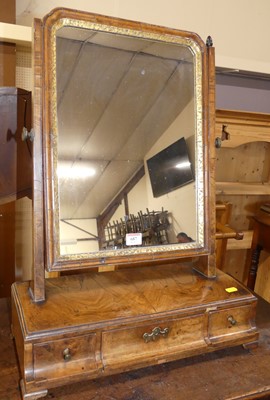 Lot 687 - An 18th century figured walnut three-drawer...