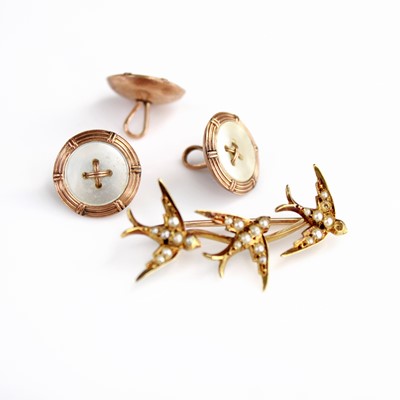 Lot 389 - A yellow metal and seed pearl set swallow...