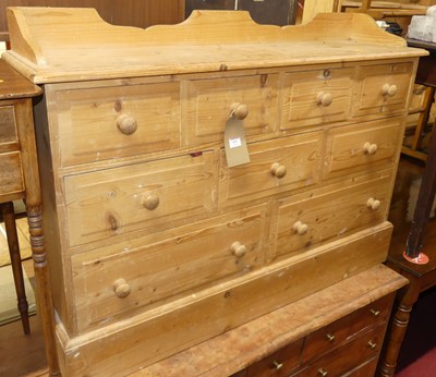 Lot 691 - A modern pine low chest, fitted with nine...