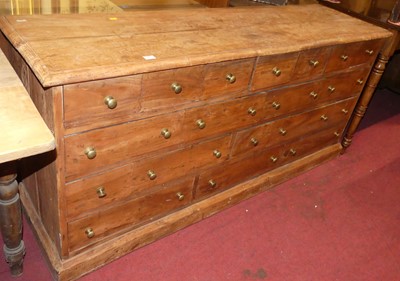 Lot 693 - A contemporary stained hardwood low side chest,...
