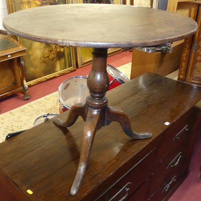 Lot 698 - An early 19th century provincial oak circular...