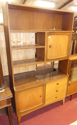 Lot 702 - A 1970s teak room divider, having an...