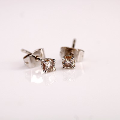 Lot 374 - A pair of 18ct white gold diamond set ear...