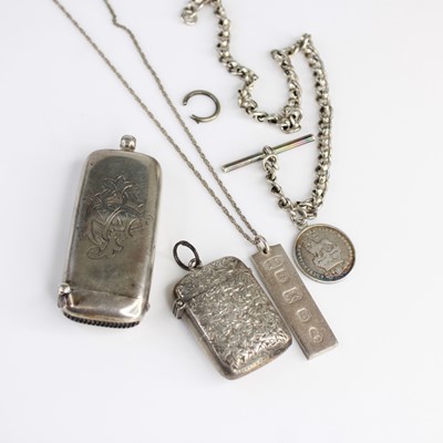 Lot 401 - A silver combination vesta sovereign case...