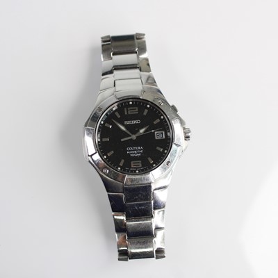Lot 410 - A Seiko Coutura gents steel case wrist watch...