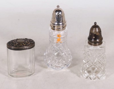 Lot 316 - An Elizabeth II silver capped cut glass sugar...
