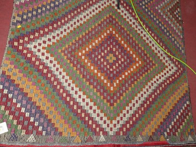 Lot 717 - An Anatolian woven Kilim runner, with bright...