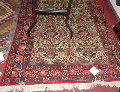 Lot 718 - A North West Persian red, blue and cream...