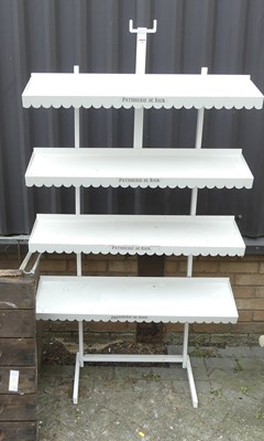 Lot 731 - A white painted metal four tier boulangerie...