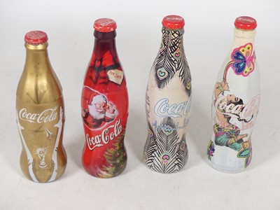 Lot 449 - A collection of collector's Coca-Cola bottles...