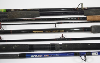 Lot 331 - A collection of fishing rods to include a...