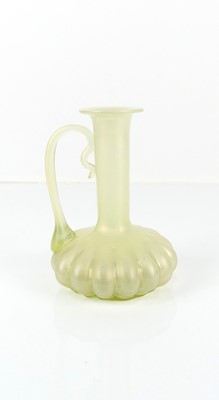 Lot 81 - A Loetz iridescent glass jug, having a...