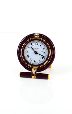 Lot 332 - A Cartier gilt brass and lacquered travel...