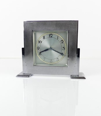 Lot 333 - An Art Deco chromed metal mantel clock, with...